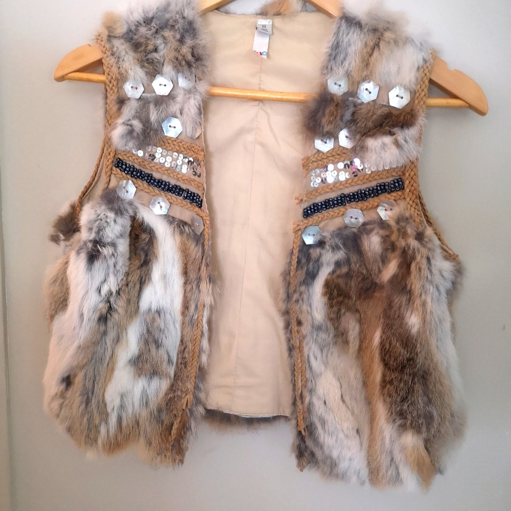 Sleeveless jacket (like new)